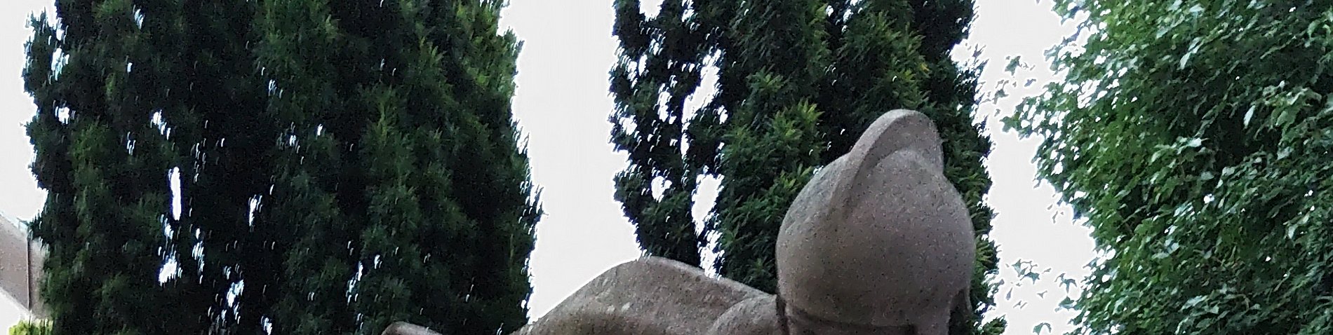 St. Martin auf einem Pferd beugt sicht herunter.